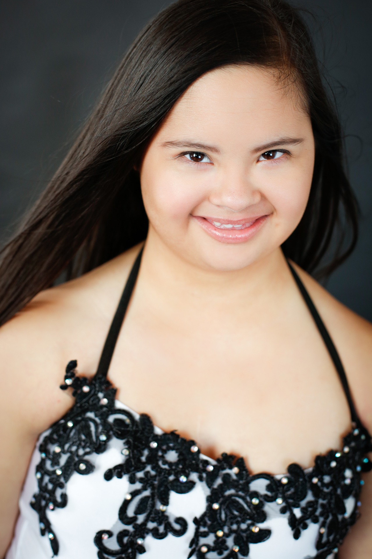 Marina is a gorgeous young lady from the north atlanta area. She is smart, funny, a great dancer. She also has Down-syndrome. Senior portraits by Starr Petronella. Her school photos were taken at the goat farm in atlanta. 